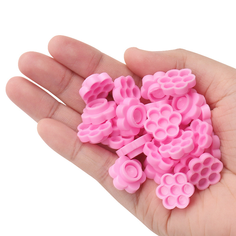 100 Pcs Pink Flower Glue Delay - مراجعة Eyelash Extension Maps وسعره
